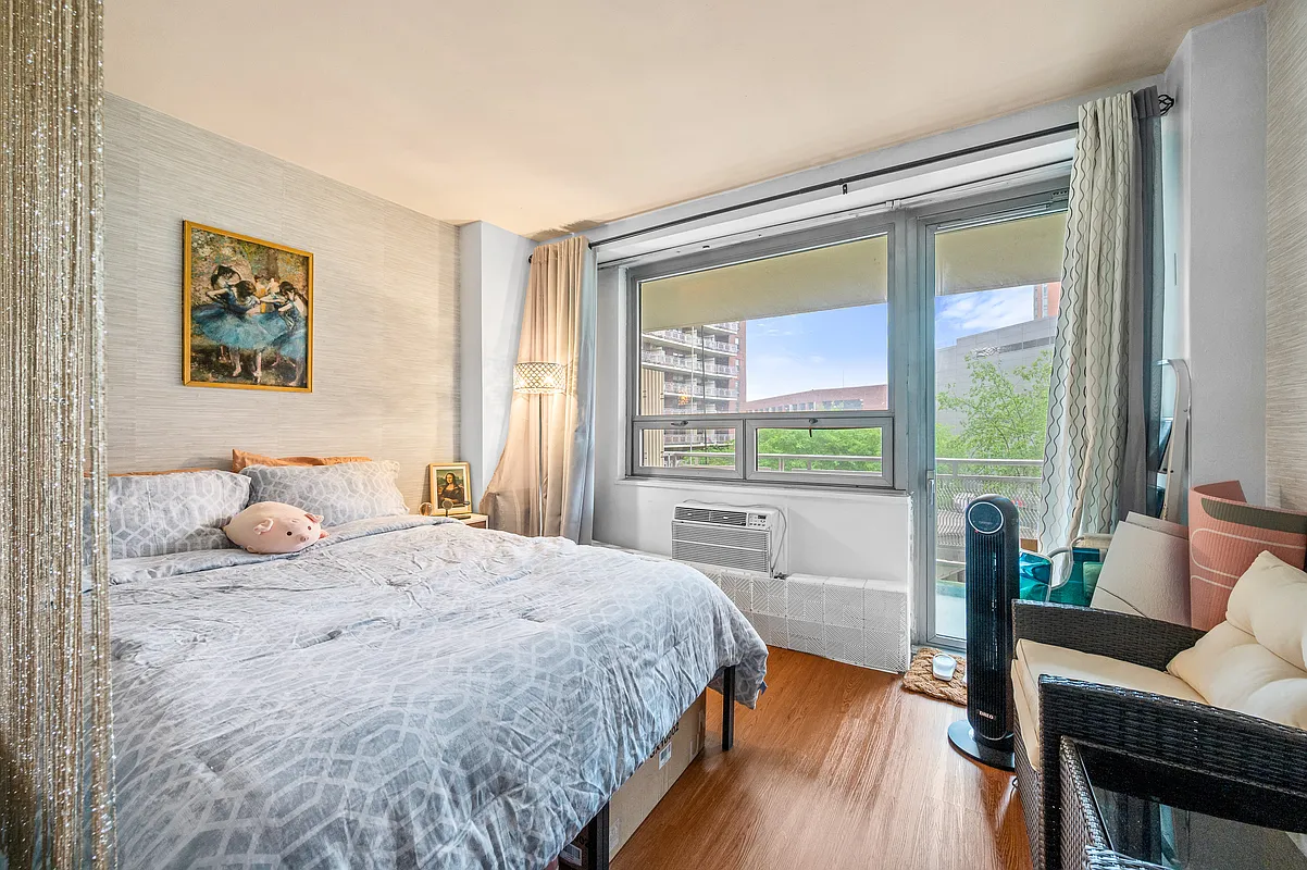 Bedroom in a co-op located in Rego Park, Queens, NYC. Co-op is listed for Sale by real estate agent Lillian Vucic.